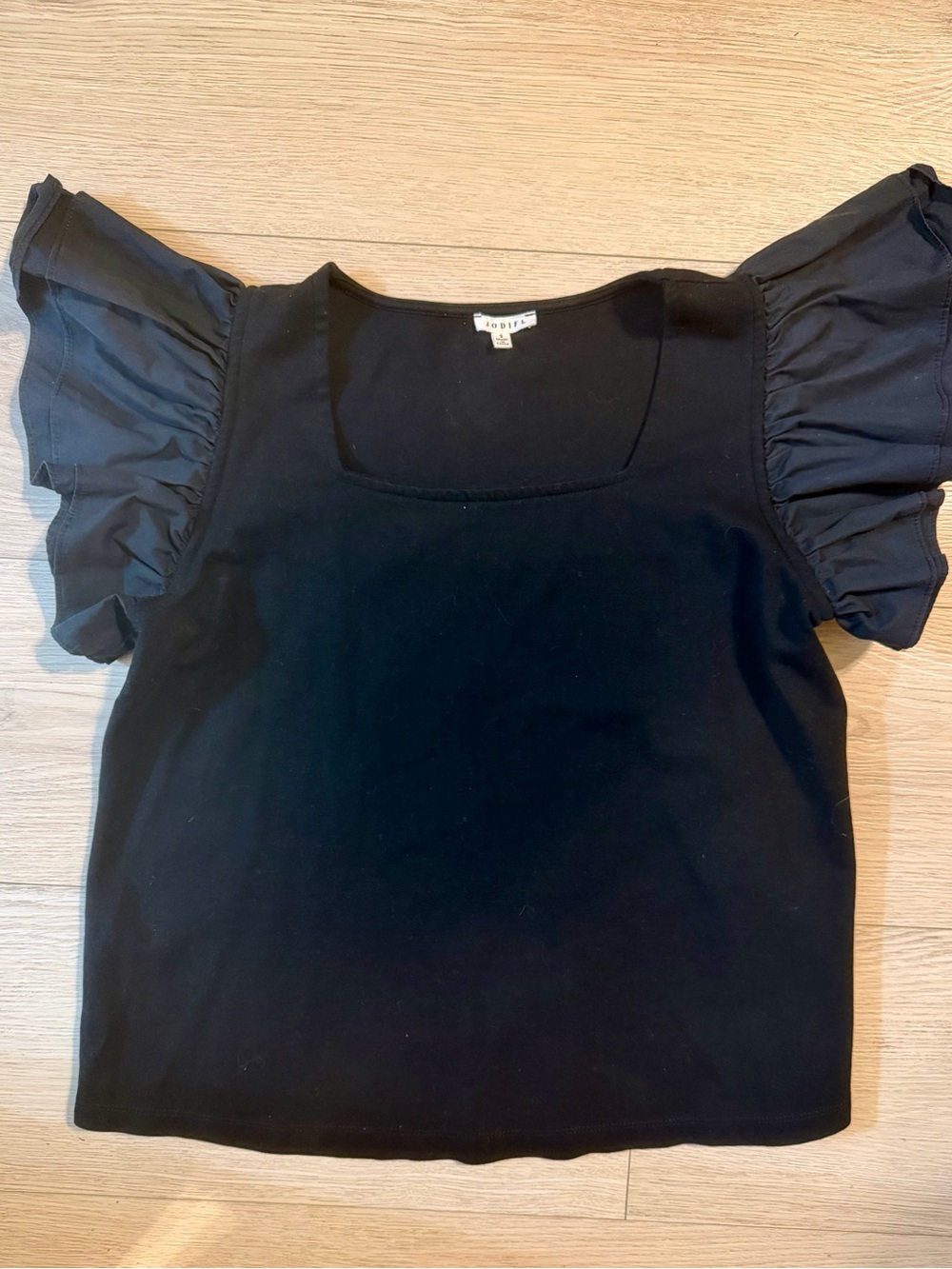 Like new black ruffle sleeve top